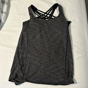 Lululemon grey top with built in grey bra in good condition - size 6